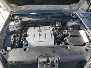 2004 Cadillac DeVille DTS z VIN 1G6KF57964U242365, wystawiony jako Copart lot #41645555 z przebiegiem Nie podano mil oraz Szkody całkowita. Historia ofert i sprzedaży dostępna na DreamBid. Obrazek 12.