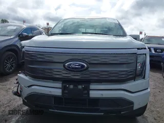 2023 Ford F-150 Lightning Pro with VIN 1FTVW1EV3PWG60491, listed as a IAAI auction lot 41507485 with 19,148 mi miles and . Bid and sale history available at DreamBid. Image 13.