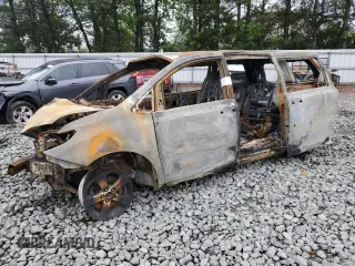 2014 Toyota Sienna LE AAS z VIN 5TDKK3DC2ES518284, wystawiony jako Copart lot #56163945 z przebiegiem Nie podano mil oraz Szkody całkowita. Historia ofert i sprzedaży dostępna na DreamBid. Obrazek 1.