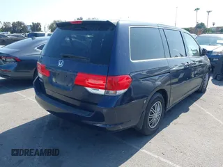 2008 Honda Odyssey LX with VIN 5FNRL38268B025424, listed as a IAAI auction lot 42432326 with 210,644 mi miles and . Bid and sale history available at DreamBid. Image 4.