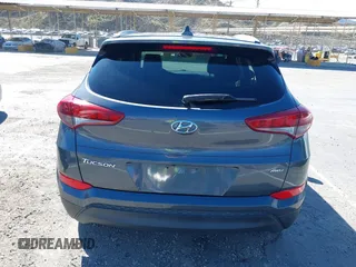 2018 Hyundai Tucson SEL with VIN KM8J3CA42JU618764, listed as a IAAI auction lot 41677046 with 127,980 mi miles. Bid and sale history available at carsss.com. Image 16.