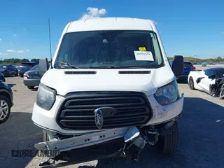 2017 Ford Transit Passenger XL with VIN 1FMZK1CM0HKA90980, listed as a IAAI auction lot 40979539 with 71,813 mi miles and . Bid and sale history available at DreamBid. Image 6.