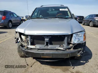 2006 GMC Envoy Denali with VIN 1GKET63M262299491, listed as a Copart auction lot 51914015 with 136,324 mi miles and Salvage Title. Bid and sale history available at carsss.com. Image 5.