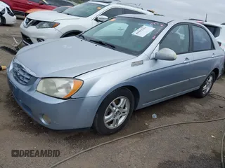 2004 Kia Spectra LX z VIN KNAFE121345017467, wystawiony jako IAAI lot #41911311 z przebiegiem 221 086 mil mil oraz . Historia ofert i sprzedaży dostępna na DreamBid. Obrazek 2.