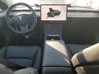 2024 Tesla Model Y Long Range with VIN 7SAYGDEE5RA270382, listed as a Copart auction lot 82899494 with 6,401 mi miles and Clean title. Bid and sale history available at DreamBid. Image 8.