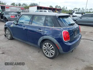 2017 MINI Hardtop 4 Door Cooper with VIN WMWXU1C54H2E19114, listed as a IAAI auction lot 42107266 with 83,524 mi miles and . Bid and sale history available at DreamBid. Image 3.