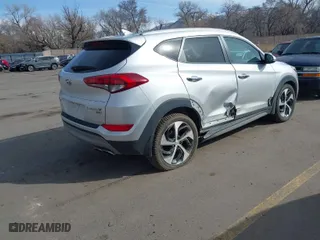 2017 Hyundai Tucson Sport with VIN KM8J3CA21HU508782, listed as a IAAI auction lot 41735813 with 77,953 mi miles. Bid and sale history available at carsss.com. Image 4.