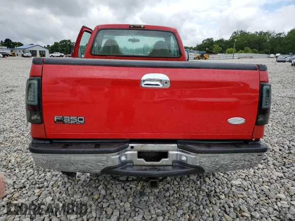 2001 Ford F-350 with VIN 3FTSF31S11MA04310, listed as a Copart auction lot 61232955 with 109,387 mi miles and Salvage title. Bid and sale history available at DreamBid. Image 6.