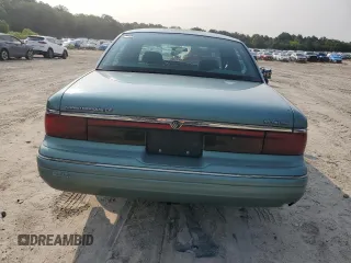 1997 Mercury Grand Marquis GS z VIN 2MELM74W2VX663313, wystawiony jako Copart lot #59539665 z przebiegiem 260 024 mil mil oraz Czysty tytuł • Clean title. Historia ofert i sprzedaży dostępna na DreamBid. Obrazek 6.