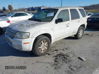 2007 Mercury Mariner Premier z VIN 4M2CU971X7KJ19817, wystawiony jako IAAI lot #41023999 z przebiegiem 232 456 mil mil oraz . Historia ofert i sprzedaży dostępna na DreamBid. Obrazek 2.