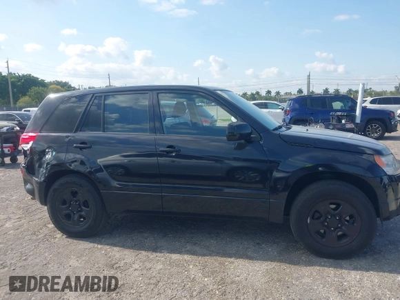 2008 Suzuki Grand Vitara with VIN JS3TE941284102380, listed as a IAAI auction lot 42061609 with 103,554 mi miles and . Bid and sale history available at DreamBid. Image 13.