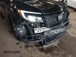 2020 Honda Passport EX-L z VIN 5FNYF8H5XLB005518, wystawiony jako IAAI lot #42021512 z przebiegiem 79 573 mil mil oraz . Historia ofert i sprzedaży dostępna na DreamBid. Obrazek 6.