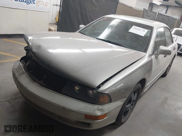 2003 Mitsubishi Diamante LS z VIN 6MMAP67P13T012396, wystawiony jako IAAI lot #40668729 z przebiegiem 157 250 mil mil oraz . Historia ofert i sprzedaży dostępna na DreamBid. Obrazek 2.