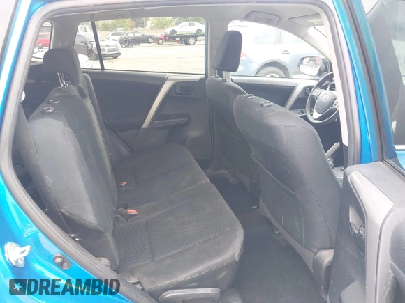 2018 Toyota RAV4 LE with VIN 2T3BFREV6JW740214, listed as a IAAI auction lot 42106349 with 105,831 mi miles and . Bid and sale history available at carsss.com. Image 8.