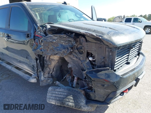 2021 Chevrolet Silverado 1500 LT Trail Boss with VIN 1GCPYFEL6MZ148202, listed as a IAAI auction lot 41908592 with 77,048 mi miles and . Bid and sale history available at DreamBid. Image 6.
