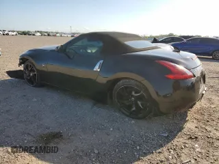 2014 Nissan 370Z Touring with VIN JN1AZ4FH3EM621279, listed as a Copart auction lot 52284814 with 60,479 mi miles and Salvage Title. Bid and sale history available at DreamBid. Image 2.