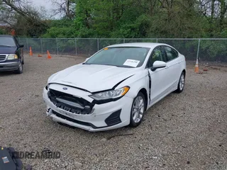 2020 Ford Fusion SE with VIN 3FA6P0LU5LR151074, listed as a IAAI auction lot 42146290 with 98,574 mi miles and . Bid and sale history available at carsss.com. Image 20.