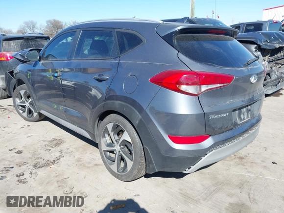 2018 Hyundai Tucson Sport with VIN KM8J33AL5JU770092, listed as a IAAI auction lot 41395349 with 101,395 mi miles. Bid and sale history available at carsss.com. Image 3.