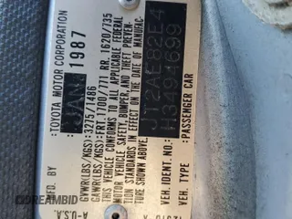 1987 Toyota Corolla с VIN JT2AE82E4H3494699, выставлен на аукционе Copart как лот 66815714 с пробегом 145 679 миль миль и Списание • Salvage title. История ставок и продаж доступна на DreamBid. Изображение 12.
