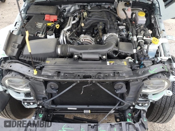 2024 Jeep Wrangler Sahara with VIN 1C4PJXEGXRW210206, listed as a Copart auction lot 58059115 with 14,492 mi miles and Salvage title. Bid and sale history available at DreamBid. Image 12.