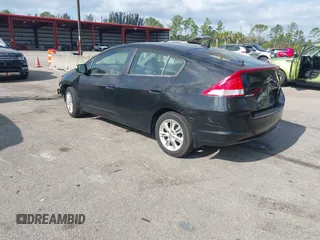 2010 Honda Insight EX with VIN JHMZE2H76AS000837, listed as a IAAI auction lot 42103333 with 146,576 mi miles and . Bid and sale history available at DreamBid. Image 3.