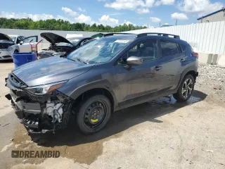 2024 Subaru Crosstrek Premium с VIN JF2GUADC2R8883323, выставлен на аукционе Copart как лот 62830785 с пробегом 5 387 миль миль и Списание • Salvage title. История ставок и продаж доступна на DreamBid. Изображение 1.