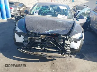 2025 Tesla Model 3 Long Range with VIN 5YJ3E1EA1SF884167, listed as a IAAI auction lot 41976320 with 3,146 mi miles and . Bid and sale history available at DreamBid. Image 6.