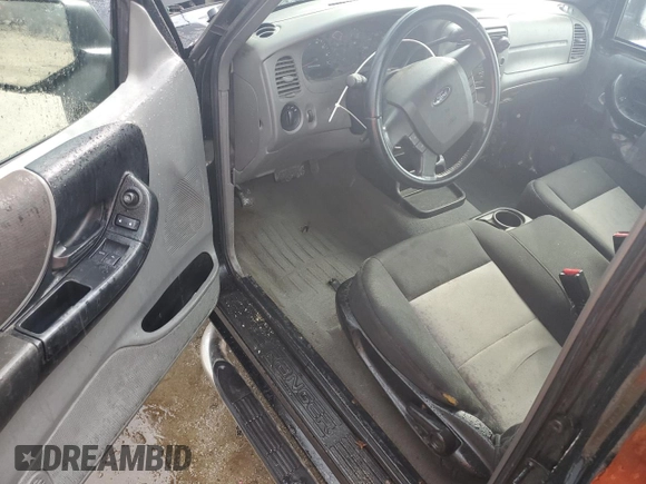 2009 Ford Ranger XL z VIN 1FTYR14D19PA35243, wystawiony jako Copart lot #54350615 z przebiegiem 207 866 mil mil oraz Szkoda całkowita • Salvage title. Historia ofert i sprzedaży dostępna na DreamBid. Obrazek 8.