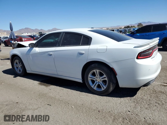 2015 Dodge Charger SE with VIN 2C3CDXBG2FH867283, listed as a Copart auction lot 47313835 with 124,448 mi miles and Salvage Title. Bid and sale history available at carsss.com. Image 2.