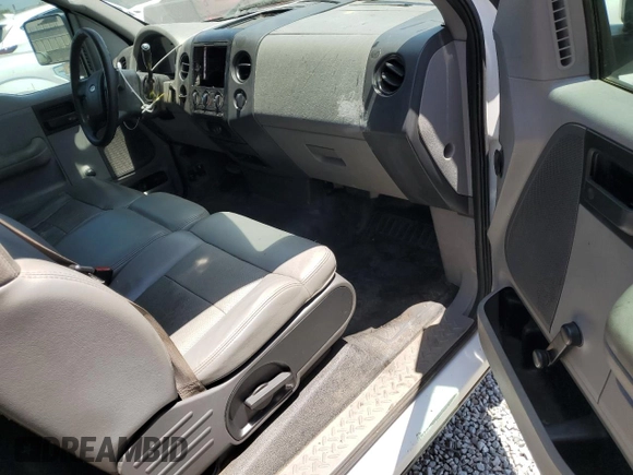 2005 Ford F-150 XL with VIN 1FTRF12255NB53669, listed as a Copart auction lot 61636135 with 156,562 mi miles and Salvage title. Bid and sale history available at DreamBid. Image 8.