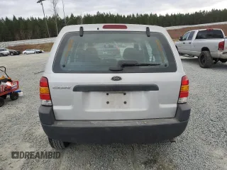 2004 Ford Escape with VIN 1FMCU02144KB63439, listed as a Copart auction lot 85310514 with 275,625 mi miles and Salvage title. Bid and sale history available at DreamBid. Image 6.