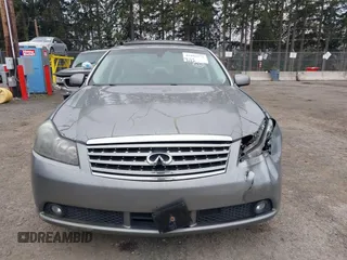 2007 Infiniti M Sport z VIN JNKAY01EX7M302565, wystawiony jako IAAI lot #41885272 z przebiegiem 151 745 mil mil oraz . Historia ofert i sprzedaży dostępna na DreamBid. Obrazek 12.