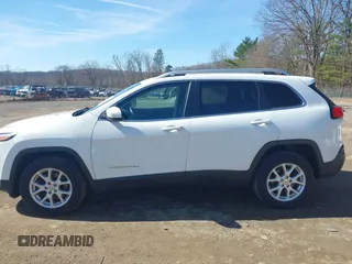 2015 Jeep Cherokee Latitude with VIN 1C4PJMCS8FW624375, listed as a IAAI auction lot 41848679 with 148,130 mi miles and . Bid and sale history available at DreamBid. Image 14.