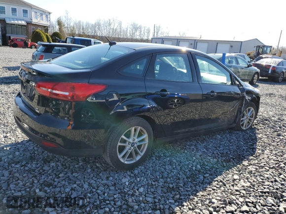 2018 Ford Focus SE with VIN 1FADP3FE9JL306394, listed as a Copart auction lot 52902175 with 77,338 mi miles and Salvage title. Bid and sale history available at DreamBid. Image 3.