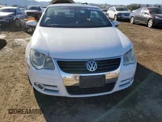 2009 Volkswagen Eos Komfort с VIN WVWAA71F79V011641, выставлен на аукционе Copart как лот 42577045 с пробегом 66 543 миль миль и Списание • Salvage title. История ставок и продаж доступна на DreamBid. Изображение 5.