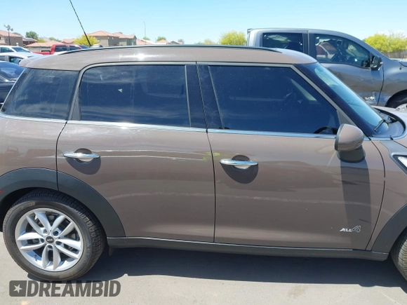 2013 MINI Countryman S ALL4 with VIN WMWZC5C54DWP34224, listed as a IAAI auction lot 42141400 with 33,307 mi miles and . Bid and sale history available at DreamBid. Image 13.