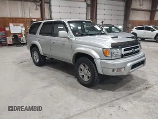 2000 Toyota 4Runner SR5 z VIN JT3HN86R6Y0307665, wystawiony jako IAAI lot #42039007 z przebiegiem 162 449 mil mil oraz . Historia ofert i sprzedaży dostępna na DreamBid. Obrazek 1.
