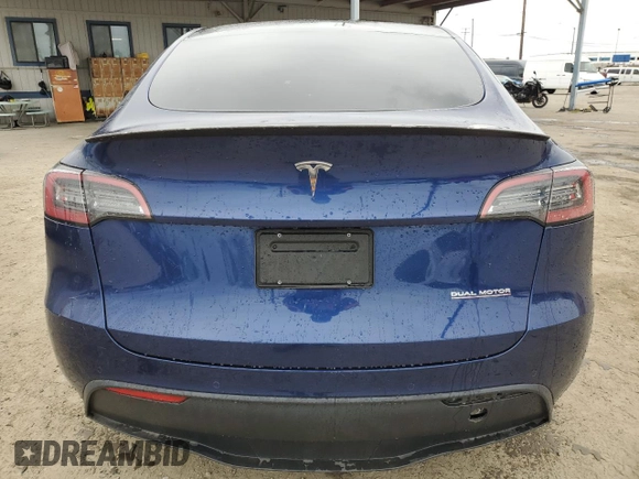 2022 Tesla Model Y Performance with VIN 7SAYGDEFXNF438281, listed as a Copart auction lot 53706435 with Not provided miles and Salvage title. Bid and sale history available at DreamBid. Image 6.