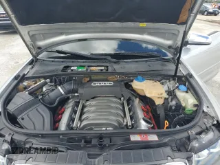 2004 Audi S4 z VIN WUARL48H74K900651, wystawiony jako Copart lot #78488794 z przebiegiem 145 251 mil mil oraz Szkody całkowita. Historia ofert i sprzedaży dostępna na DreamBid. Obrazek 11.