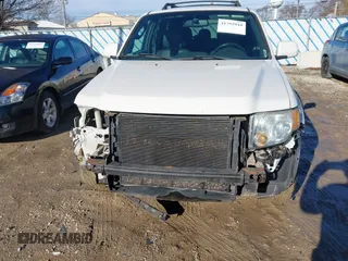 2011 Ford Escape Limited with VIN 1FMCU9EG5BKC09796, listed as a IAAI auction lot 41792944 with 134,117 mi miles. Bid and sale history available at carsss.com. Image 6.