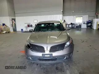 2016 Lincoln MKS с VIN 1LNHL9DK3GG600907, выставлен на аукционе Copart как лот 56892995 с пробегом 122 220 миль миль и Списание • Salvage title. История ставок и продаж доступна на DreamBid. Изображение 14.