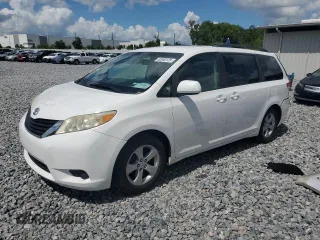 2011 Toyota Sienna LE AAS with VIN 5TDKK3DC9BS100400, listed as a Copart auction lot 62060125 with 210,274 mi miles and Salvage title. Bid and sale history available at DreamBid. Image 1.
