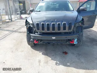 2015 Jeep Cherokee Trailhawk with VIN 1C4PJMBS3FW520328, listed as a IAAI auction lot 41746017 with 83,485 mi miles. Bid and sale history available at carsss.com. Image 6.
