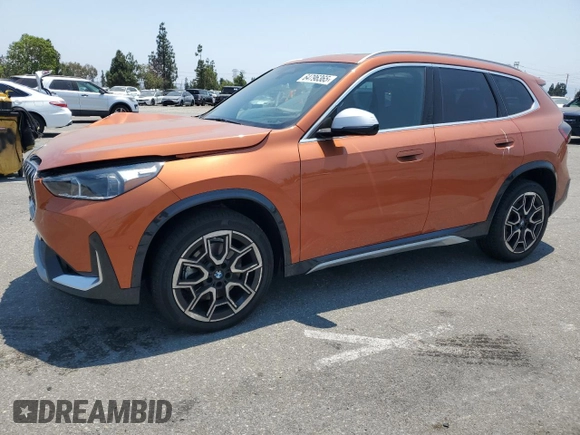 2023 BMW X1 xDrive28i with VIN WBX73EF03P5W54209, listed as a Copart auction lot 64796365 with 19,591 mi miles and Salvage title. Bid and sale history available at DreamBid. Image 1.