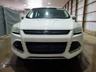 2014 Ford Escape SE with VIN 1FMCU9G98EUC19083, listed as a Copart auction lot 63421915 with 108,042 mi miles and Clean title. Bid and sale history available at DreamBid. Image 5.