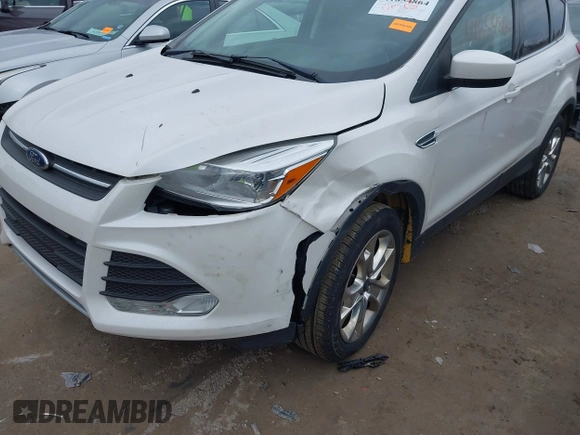 2016 Ford Escape SE with VIN 1FMCU9G94GUB55448, listed as a IAAI auction lot 41854864 with 153,457 mi miles. Bid and sale history available at carsss.com. Image 6.