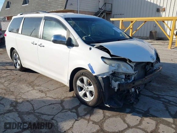 2014 Toyota Sienna LE AAS with VIN 5TDKK3DC2ES483679, listed as a IAAI auction lot 41547261 with 142,697 mi miles. Bid and sale history available at carsss.com. Image 1.