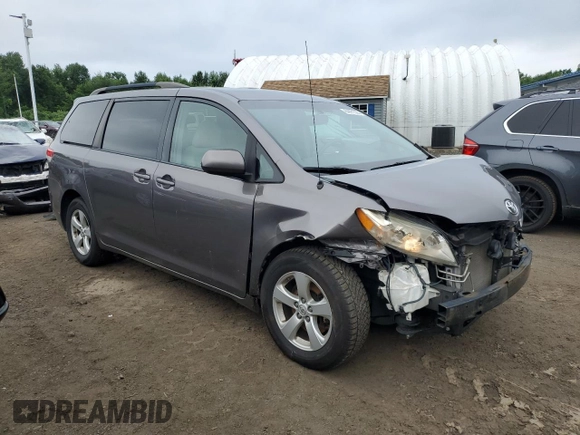 2014 Toyota Sienna LE AAS with VIN 5TDKK3DC9ES521442, listed as a Copart auction lot 64471525 with 331,395 mi miles and Salvage title. Bid and sale history available at DreamBid. Image 4.