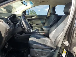 2015 Ford Edge Titanium z VIN 2FMTK4K88FBB56310, wystawiony jako Copart lot #53851524 z przebiegiem 170 380 mil mil oraz Szkody całkowita. Historia ofert i sprzedaży dostępna na DreamBid. Obrazek 7.