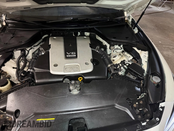 2014 Infiniti Q50 Sport with VIN JN1BV7AP7EM689505, listed as a IAAI auction lot 42172352 with 133,824 mi miles and . Bid and sale history available at DreamBid. Image 10.